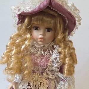 Elegant Purple and White Lace Doll with Stand